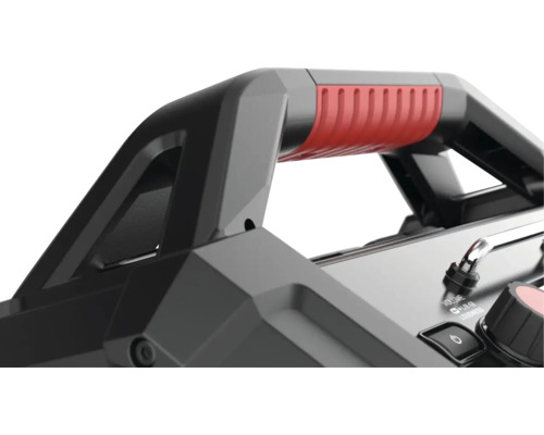 Detailansicht eines tragbaren Lautsprechers mit Tragegriff und Bedienelementen