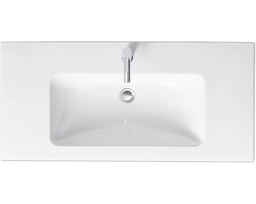 Aufnahme von oben eines Aufsatzwaschbeckens mit Armatur und Abflussventil