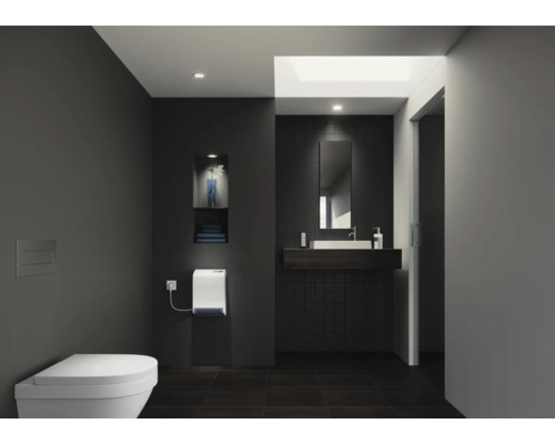 Modernes Badezimmer mit Toilette, Handtrockner und Waschtisch