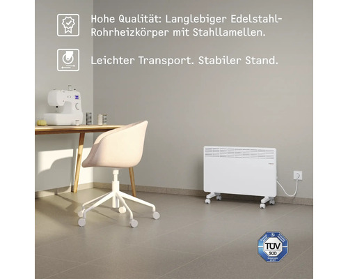 Szene mit einem Heizkörper auf Rollen in einem Raum mit Nähtisch und Stuhl. Der Heizkörper ist mobil und leicht zu transportieren.