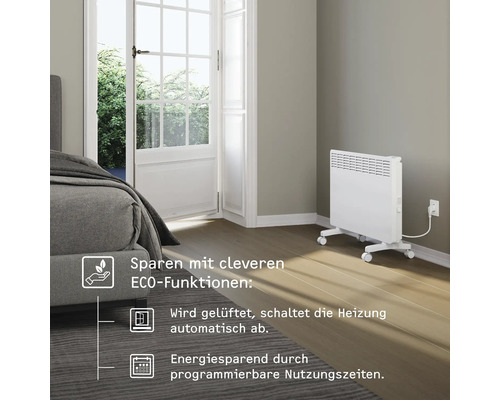 Szene eines Zimmers mit einem weißen Elektroheizkörper auf Rollen