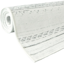 Gerollter Teppich mit Muster