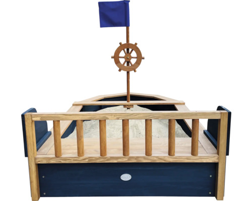 Sandkasten in Bootsform mit Lenkrad und Fahne