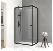 Eckdusche mit schwarzem Rahmen, Duschkopf und Duschhocker mit Handtüchern im Badezimmer.