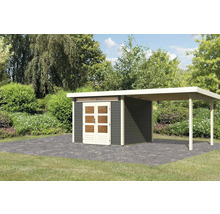 Gartenhaus mit Carport auf gepflastertem Untergrund
