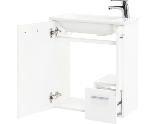 Weißer Waschtischunterschrank mit offen stehender Tür und Schublade