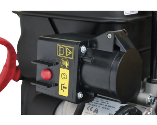 Detailansicht eines Gerätes mit Bedienelementen und Sicherheitshinweisen