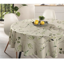 Runder Tisch mit Tischdecke mit Pflanzenmuster