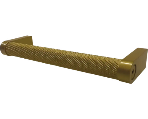 Goldfarbener Möbelgriff mit Rändelmuster