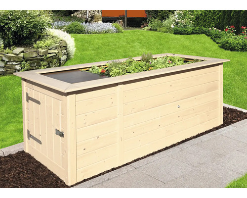 Hochbeet aus Holz mit Kräutern und Abdeckung im Garten