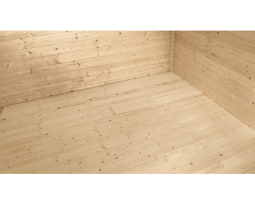 Helle Holzwand und Holzboden im Innenraum