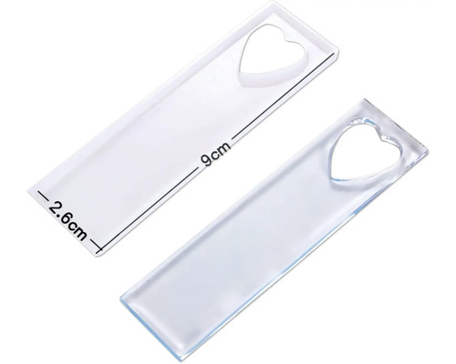Zwei transparente Lesezeichenformen aus Silikon mit Herzform und den Maßen 9 cm Länge und 2,6 cm Breite.