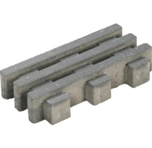 Grauer Rasenbordstein aus Beton