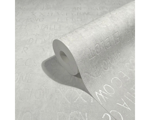 Tapetenrolle mit Buchstabenmuster