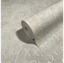 Tapetenrolle mit Buchstabenmuster