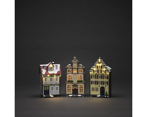 LED Szenerie Konstsmide Weihnachtshäuser 3 tlg. 14 LEDs Lichtfarbe bernstein dimmbar batteriebetrieben inkl. 6 Stunden Timer Drei beleuchtete dekorative Häuser für die Weihnachtszeit.