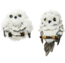 Zwei dekorative, gefiederte Eulenfiguren