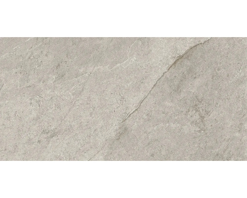 Nahaufnahme einer grauen Bodenfliese mit matter Oberfläche