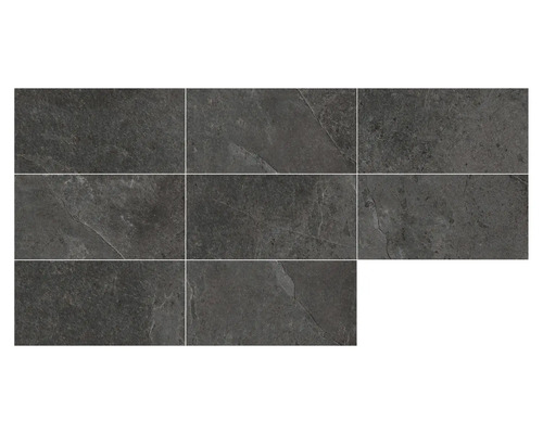 Mehrere dunkle Fliesen mit Steinoptik, die ein Muster bilden