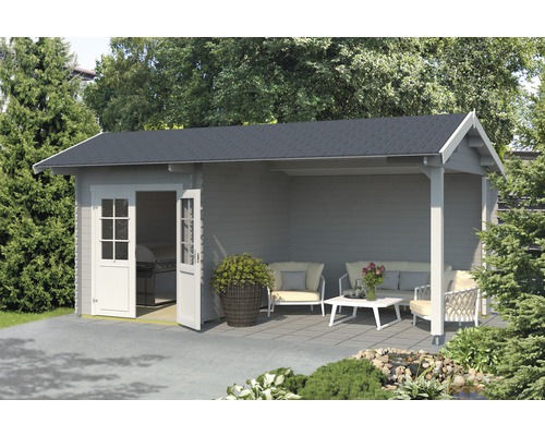 Gartenhaus mit Überdachung und Gartenmöbeln auf Terrasse