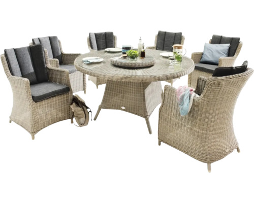 Gartengarnitur mit rundem Tisch und sechs Korbsesseln mit Polsterauflagen