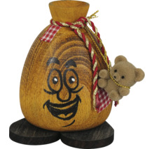 Holzfigur mit Gesicht, Teddybär und Dekoration