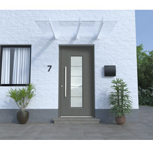 Fassade eines Hauses mit Haustür, Vordach, Fenster und Briefkasten