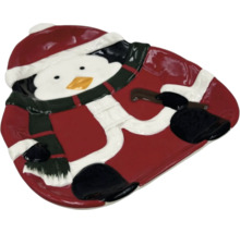 Teller in Pinguinform mit Winterbekleidung