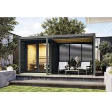 Gartenhaus mit Sauna und Sitzbereich auf einer Terrasse mit Garten