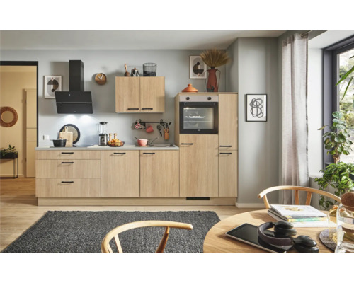 PICCANTE Plus Küchenzeile mit Geräten Casual 280 cm eiche aviva matt vormontiert Variante rechts 4067368014038 Helle Küche mit Einbauschränken, Dunstabzugshaube und Elektroherd.