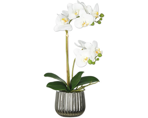 Künstliche Orchidee in einem silberfarbenen Topf