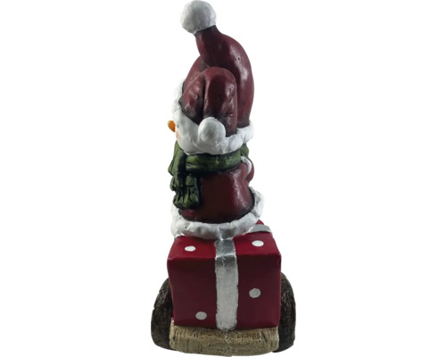 Dekorative Schneemannfigur mit Geschenk für die Weihnachtszeit
