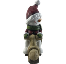 Dekorativer Schneemann auf Holzroller für den Innenbereich