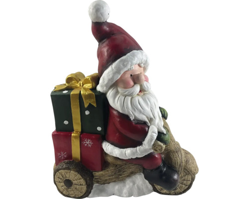 Weihnachtsmannfigur auf Holzfahrzeug mit Geschenken