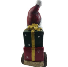 Dekofigur Weihnachtsmann auf Geschenken