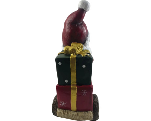 Dekofigur Weihnachtsmann auf Geschenken