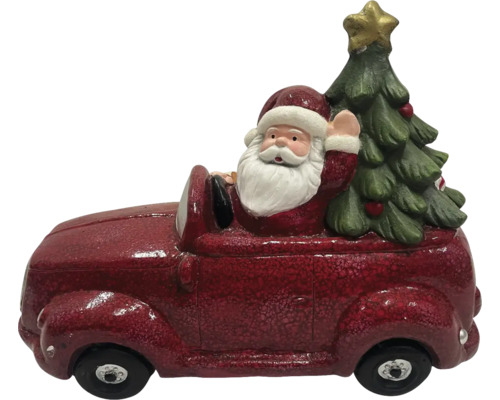 Weihnachtsdekoration: Weihnachtsmann im Auto mit Weihnachtsbaum
