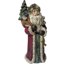 Dekorative Weihnachtsmannfigur mit Sack und Baum