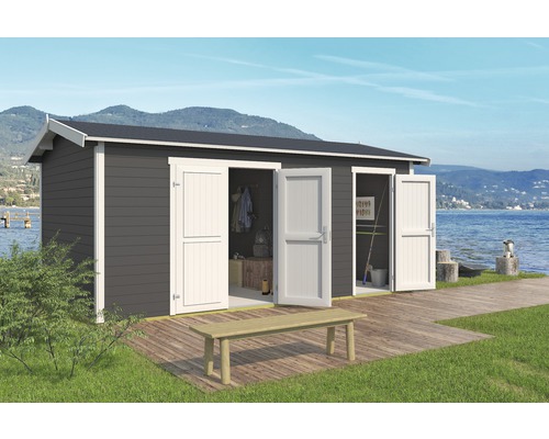 Graues Gartenhaus mit Doppeltüren und Holzbank am See