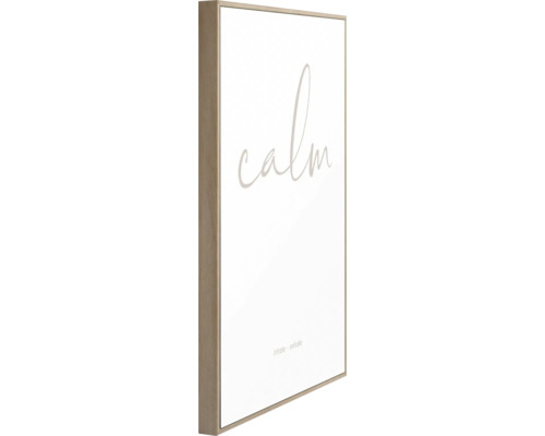 Gerahmtes Bild mit dem Schriftzug Calm, Inhale und Exhale als Wanddekoration