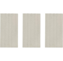 Drei helle Betonplatten mit gerillter Oberfläche
