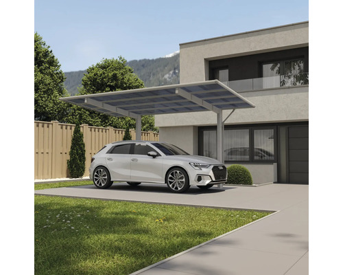 Modernes Haus mit Carport und parkendem Auto