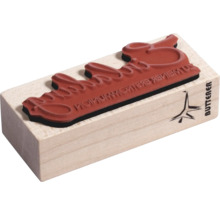 Holzstempel mit dem Schriftzug Zu Deiner Erstkommunion