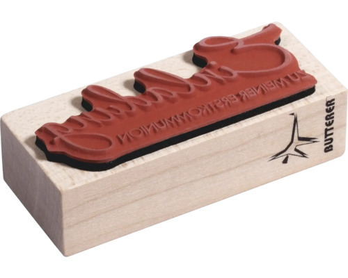 Holzstempel mit dem Schriftzug Zu Deiner Erstkommunion