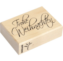 Holzstempel mit der Aufschrift Frohe Weihnachten