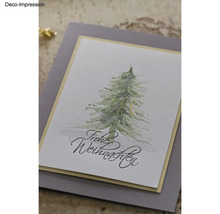 Dekorative Weihnachtskarte mit Tannenbaum und dem Schriftzug Frohe Weihnachten.