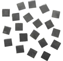 Mehrere schwarze Mosaiksteine
