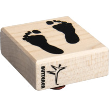 Holzstempel mit Fußabdruckmotiv und Butterer Logo.