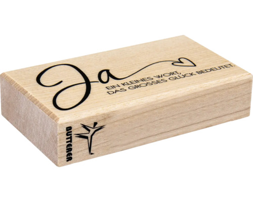 Holzstempel mit dem Schriftzug Ja und einem Herz