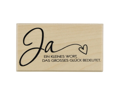 Holzstempel mit der Aufschrift Ja und einem Herz